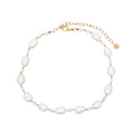 Chaine de cheville dorée petites et grandes perles de culture fil beige