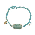 Bracelet cordon turquoise avec amazonite ovale cerclée de doré