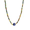 Collier doré perles multicolores et oeil 40 cm