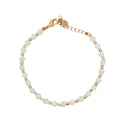 Bracelet doré avec agate blanche et perles dorées