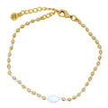 Bracelet guillochées doré et perle de nacre