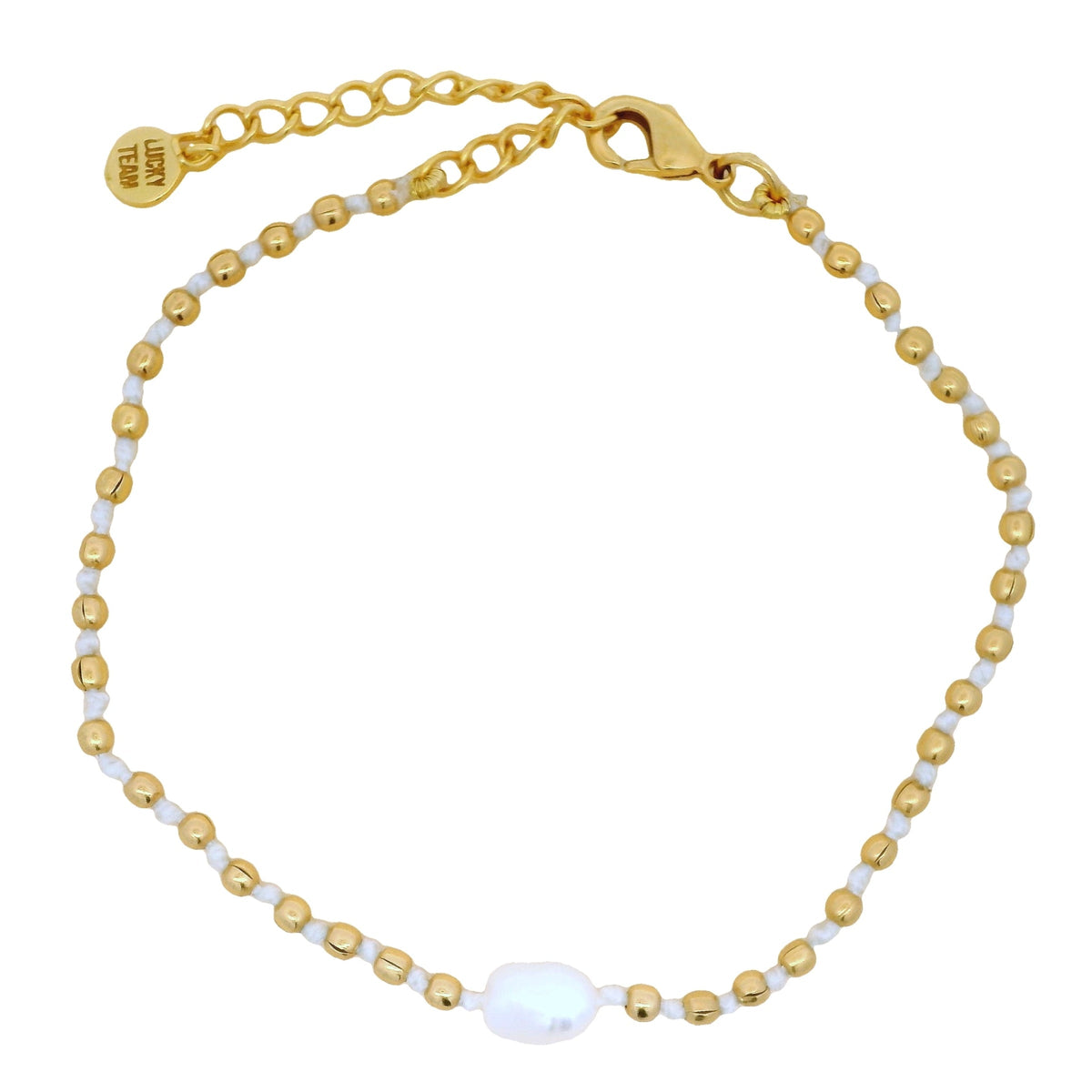 Bracelet guillochées doré et perle de nacre