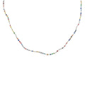Collier doré petites perles multicolores et noeuds blancs 50 cm