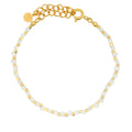 Bracelet doré et pierre de lune facettée