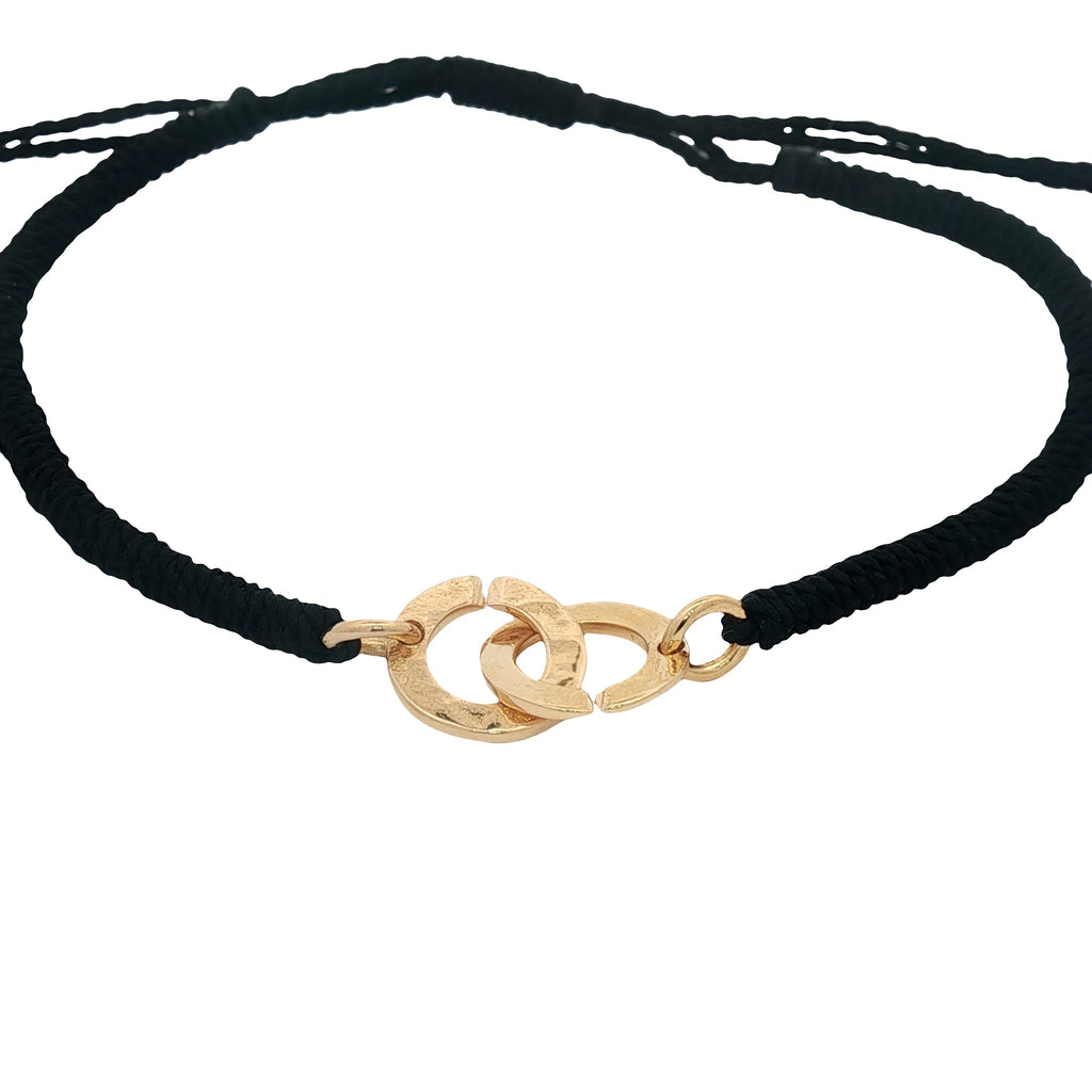 Bracelet cordon noir menottes dorées
