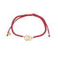 Bracelet cordon rouge menottes dorées