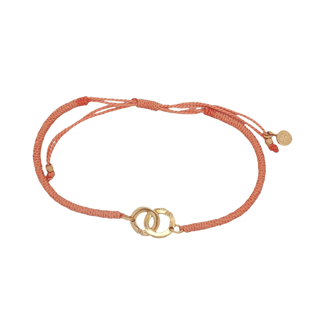 Bracelet cordon orange menottes dorées