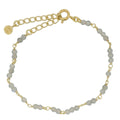 Bracelet doré et petites pierres en labradorite