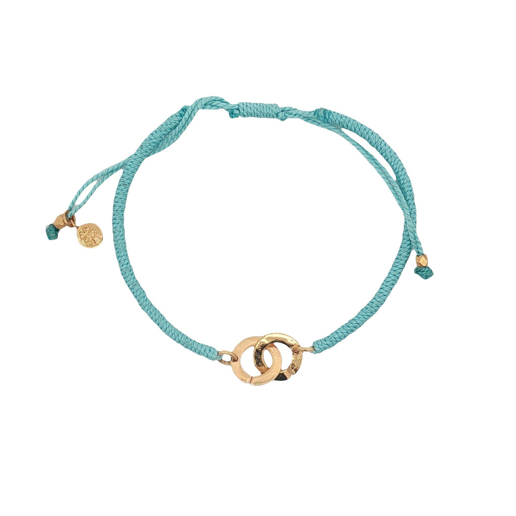Bracelet cordon turquoise menottes dorées
