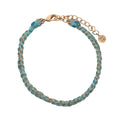 Bracelet brésilien doré cordon turquoise chaine dorée GM