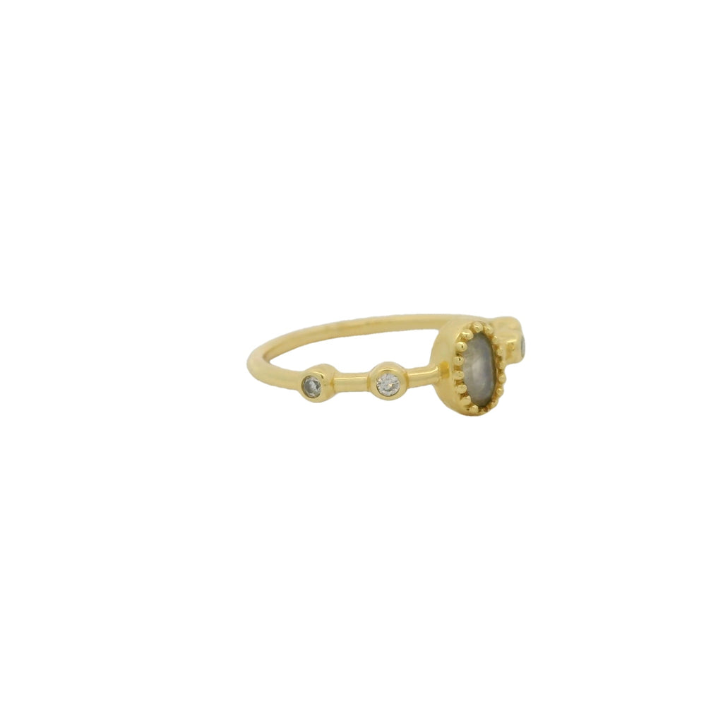 Bague dorée pierre ovale et zircons