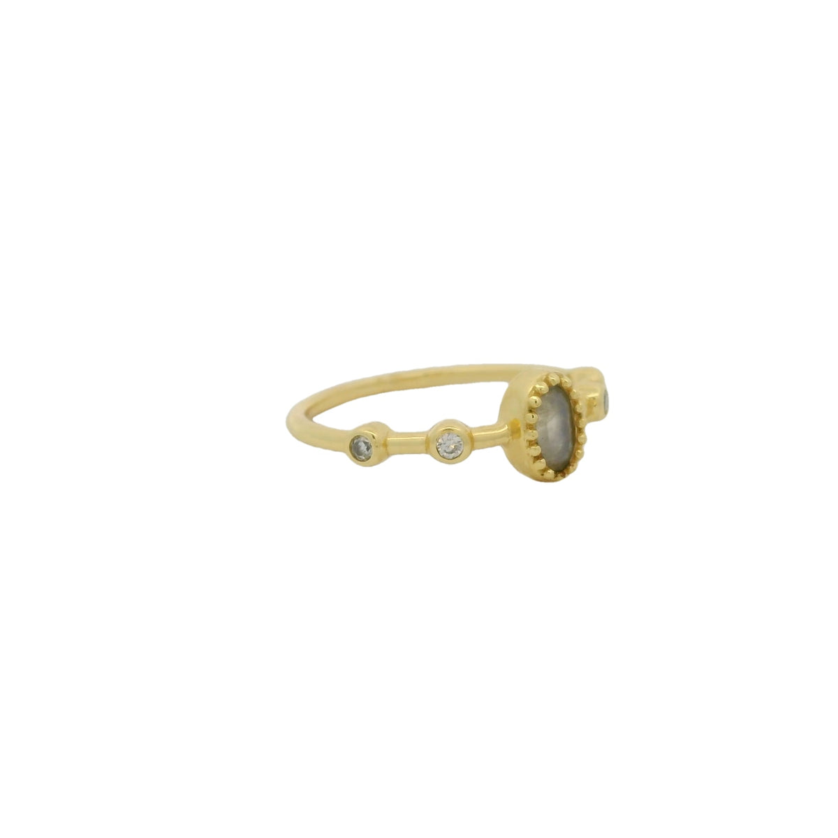 Bague dorée pierre ovale et zircons