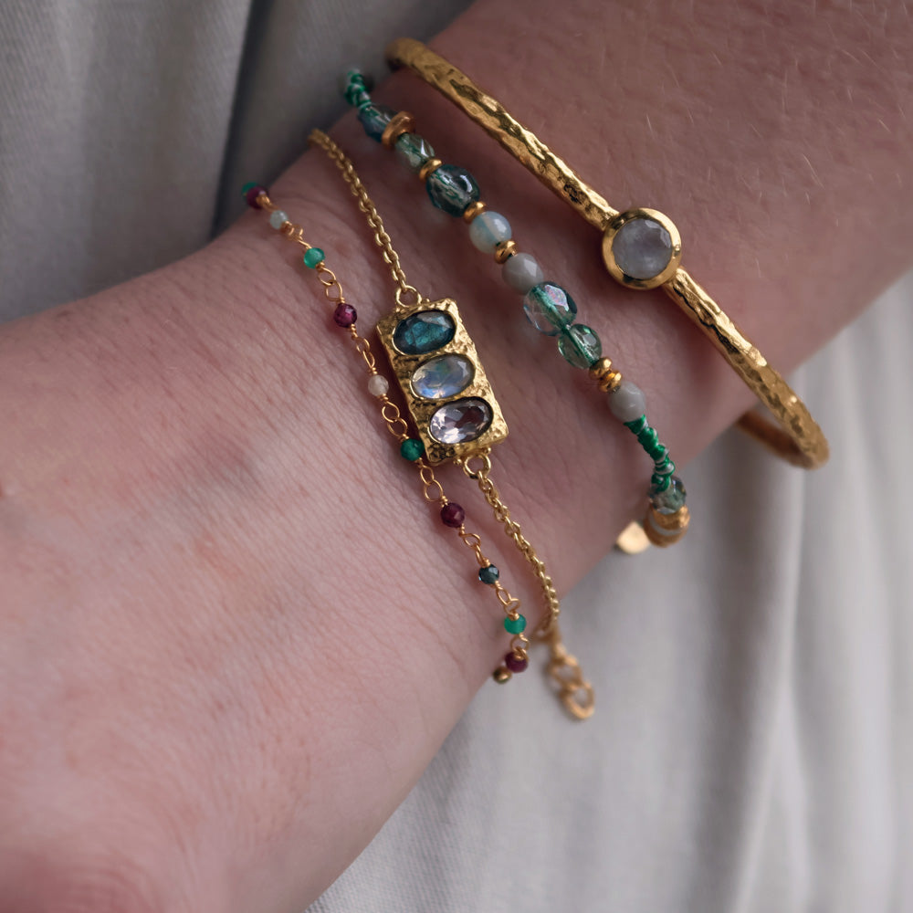 Bracelet mix perles disques dorés et noeuds