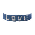 Bracelet brésilien doré fil tissé bleu marine et crème "love"