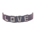 Bracelet brésilien doré fil tissé marron foncé et crème "love"