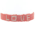 Bracelet brésilien doré fil tissé corail et crème "love"