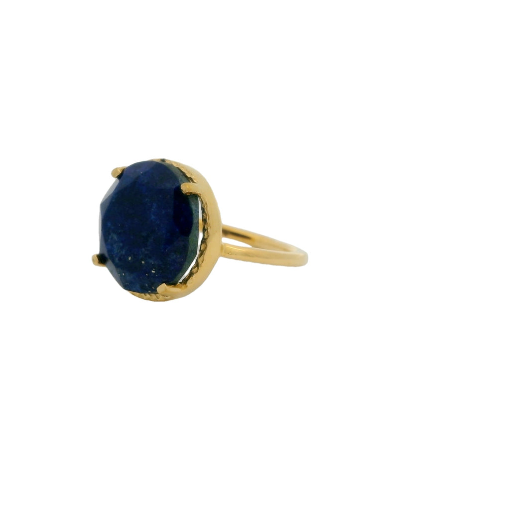 Bague dorée pierre ronde 4 griffes
