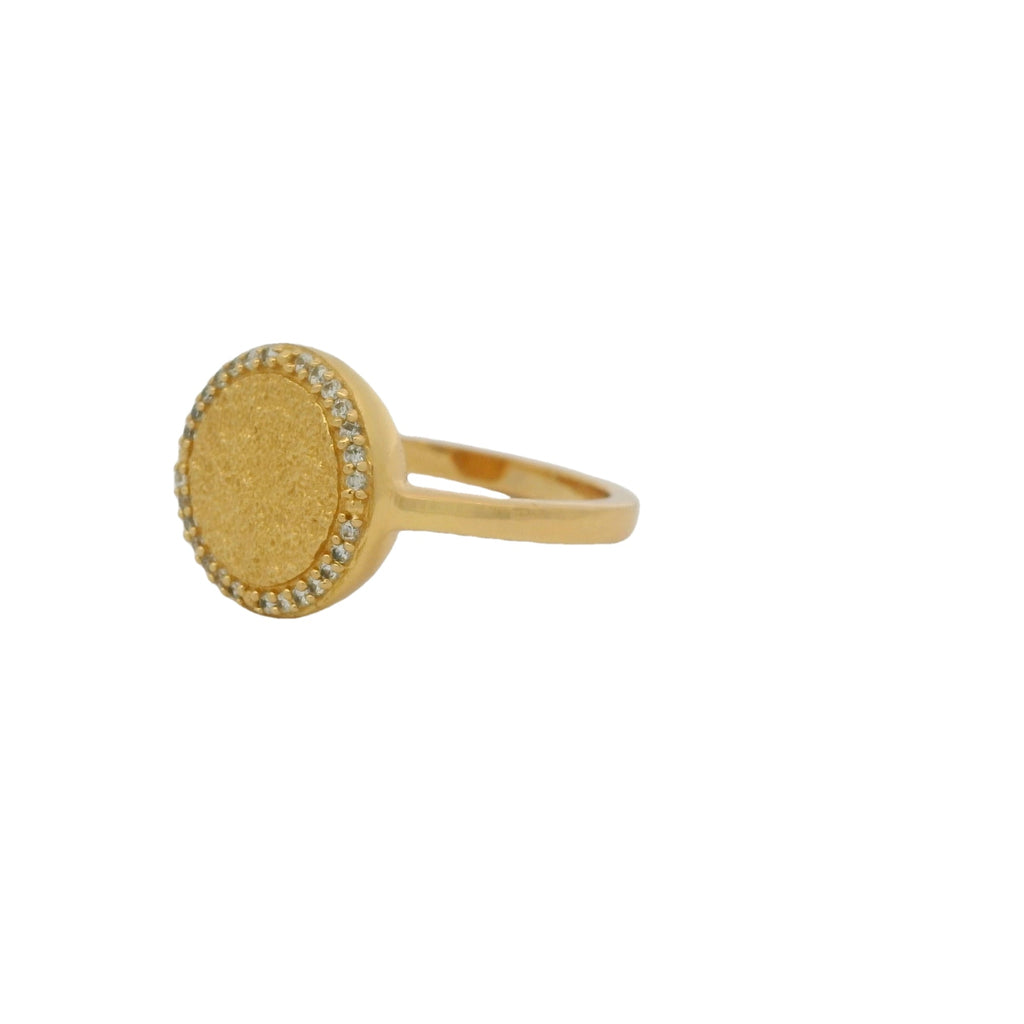 Bague dorée médaille martelée et zircons